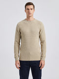 Front studio view of a model wearing a Beige Men's Crewneck Sweater with textured grid knit and ribbed trim.