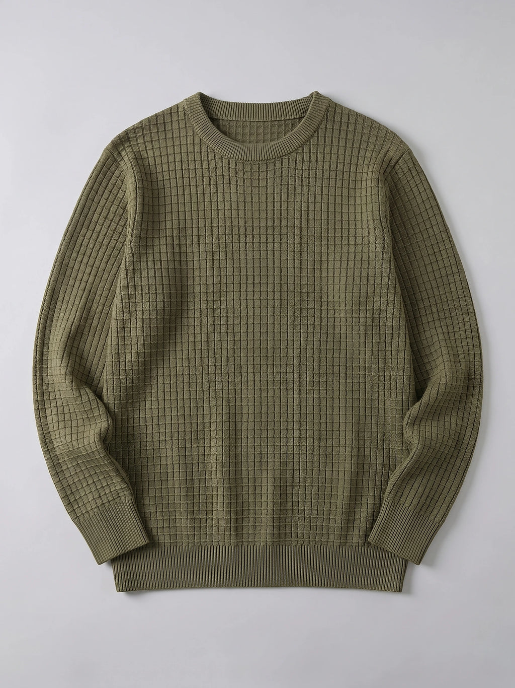 Green Men's Crewneck Sweater laid flat, featuring a textured grid knit with ribbed crewneck, cuffs, and hem.