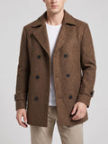 Front studio view of a model wearing a Brown wool Peacoat with double-breasted buttons, wide lapels, and cuff tabs.