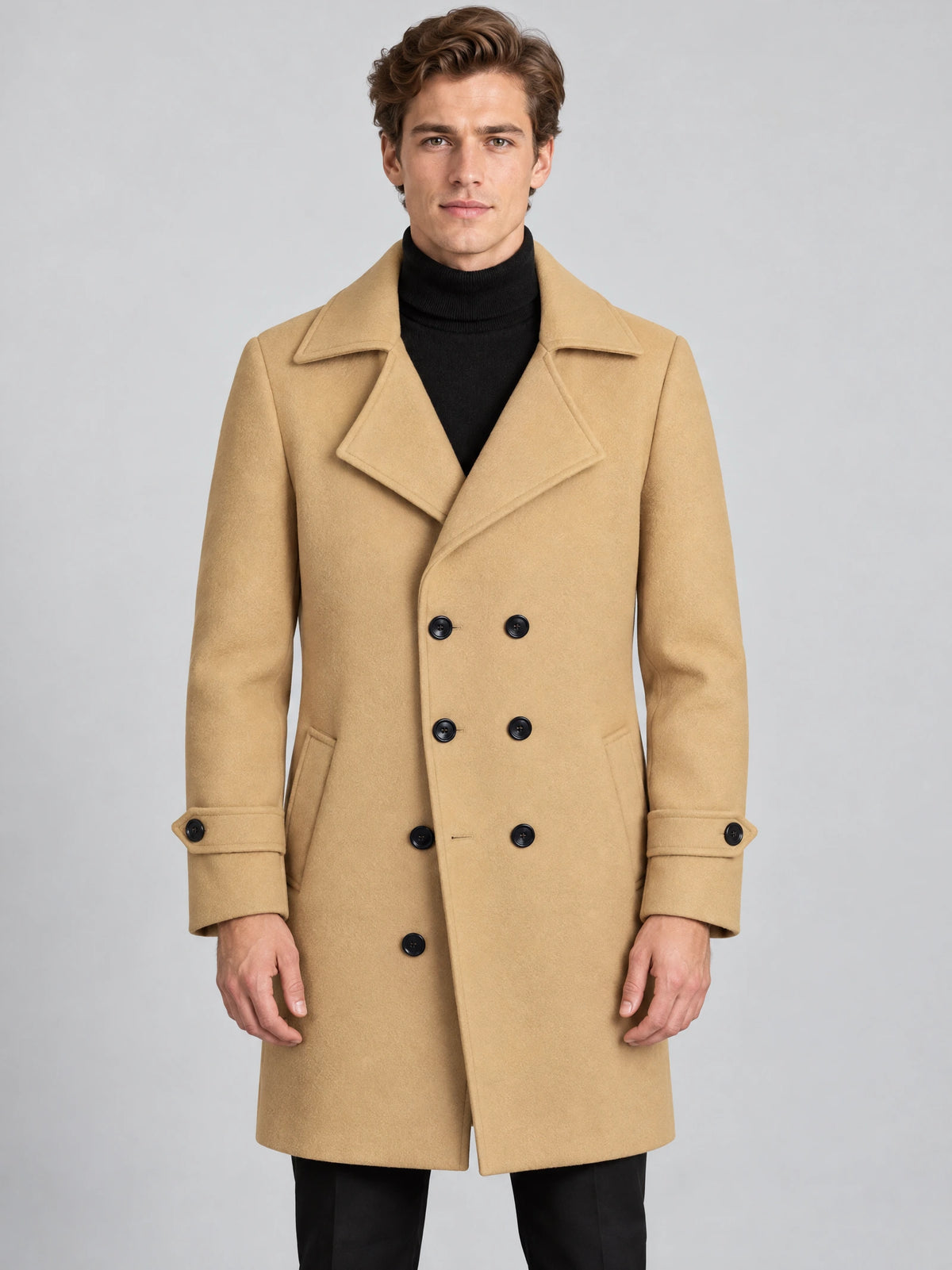 Front studio view of a model wearing a Khaki double-breasted woolen coat with wide lapels and cuff tabs.