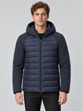 Model wearing a Navy Down Fall Jacket with a hood, zip-front closure, and quilted padded body in a front studio view.