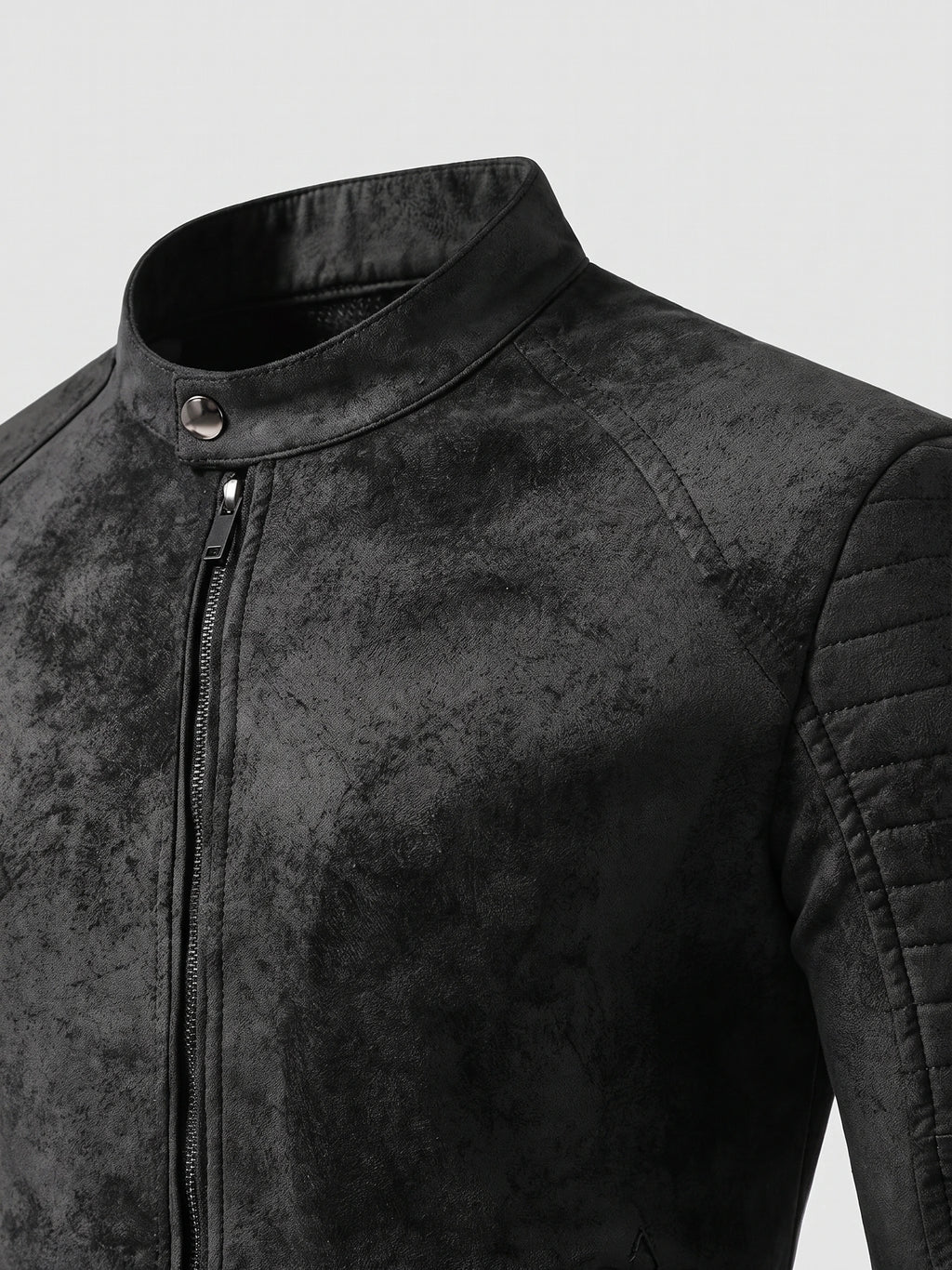 Close-up of a Black men’s Fall Jacket showing the faux leather stand collar, snap tab, front zipper, and quilted shoulder stitching.