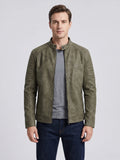 Front studio view of a model wearing a Green faux leather Fall Jacket with a stand collar, zip front, and quilted shoulder panels.