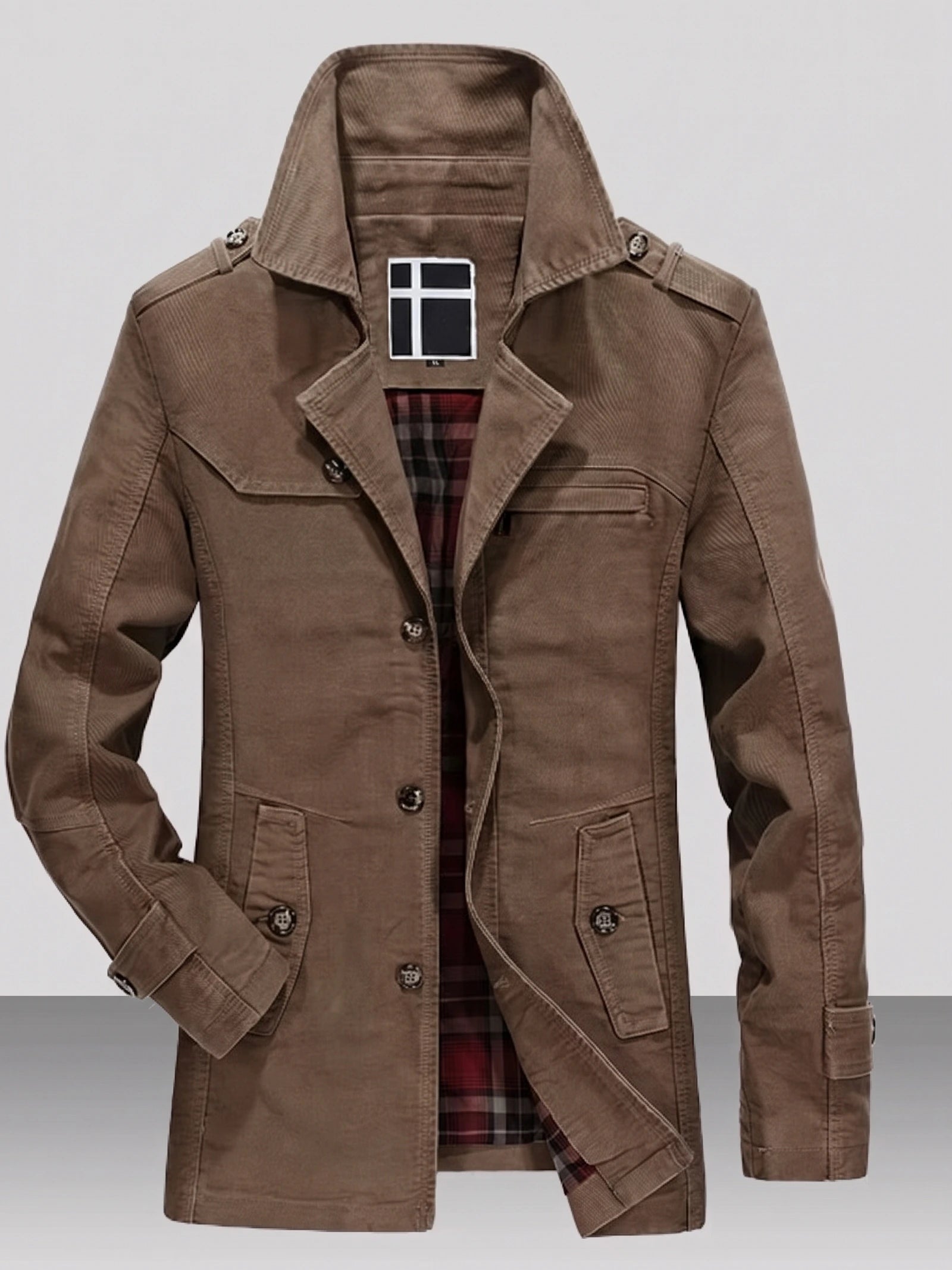 Brown cotton Fall Trench Coat laid flat, showing the open collar, button front, flap pockets, shoulder tabs, and plaid lining.