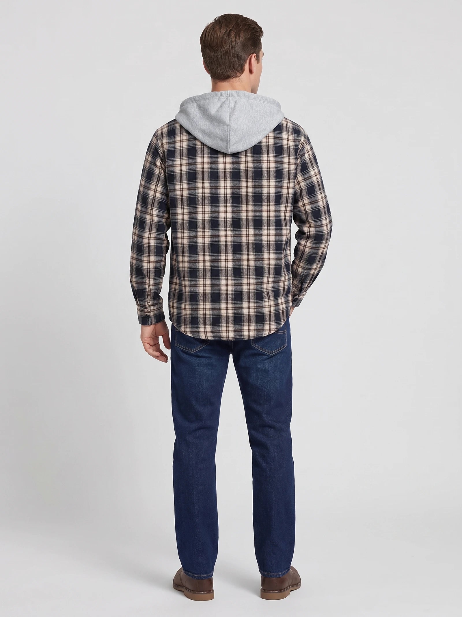 Rear studio view of a model wearing a Black plaid Flannel Jacket with an attached hood.