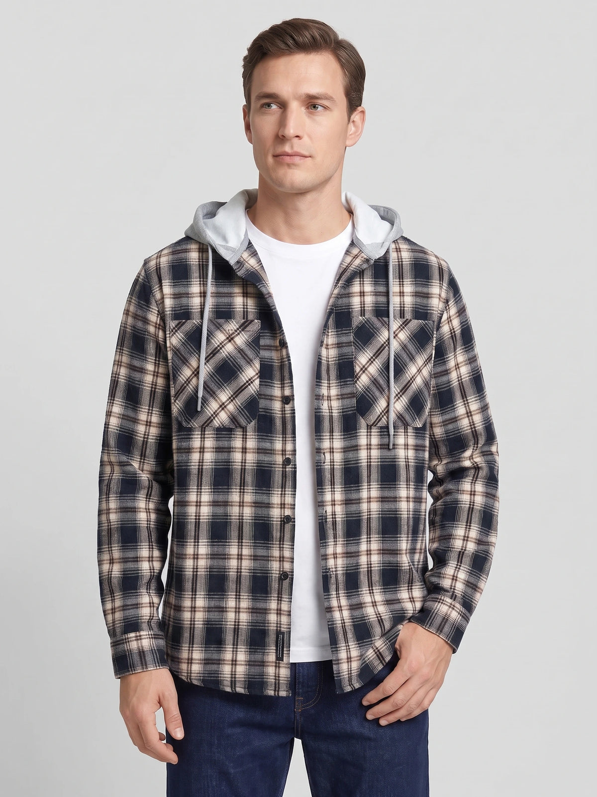 Model wearing a Black plaid flannel jacket with a hood, button front, and chest pockets in a front studio view.