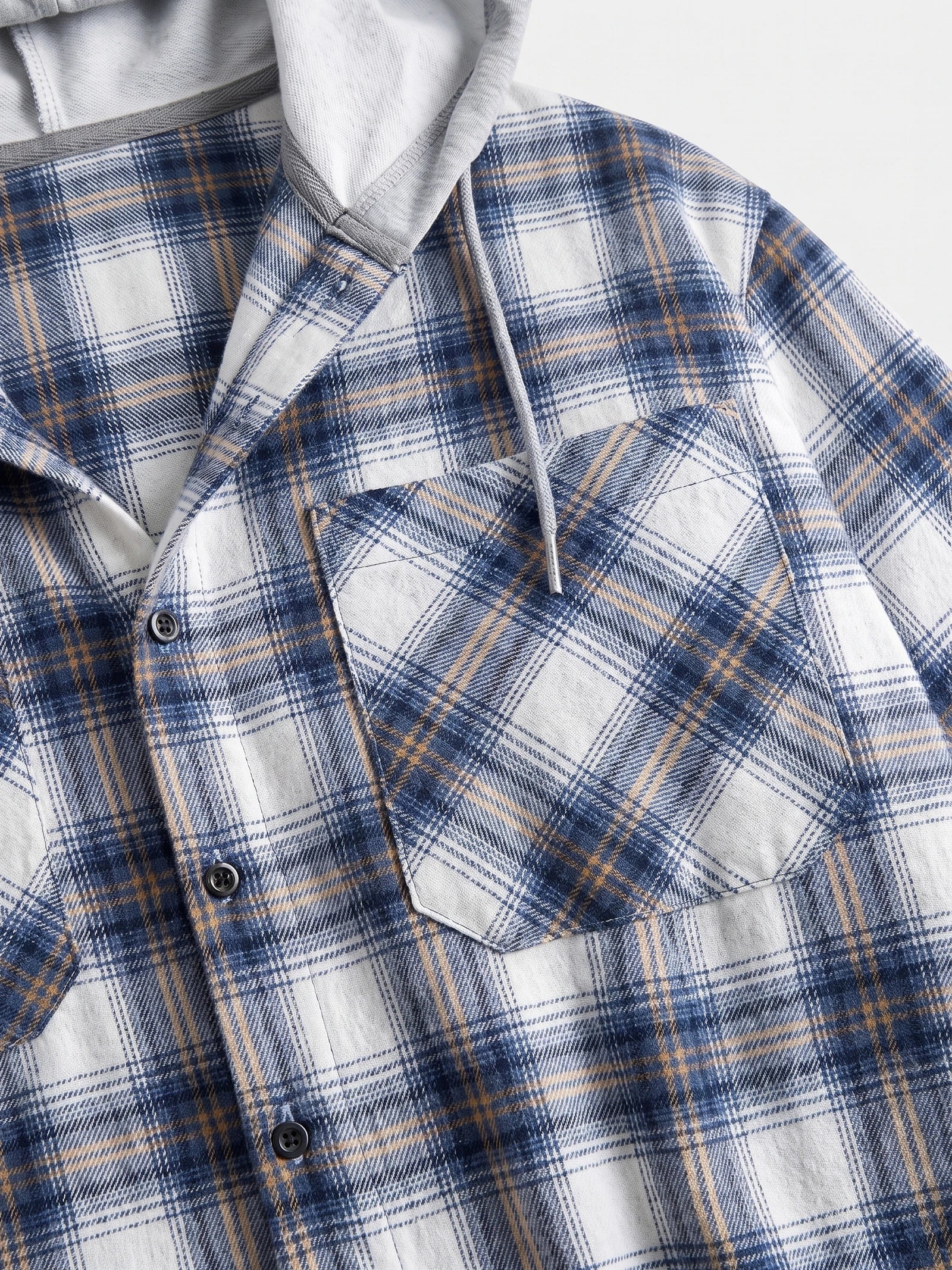Blue Flannel Jacket detail showing the hood drawstring, button front, and chest flap pocket.