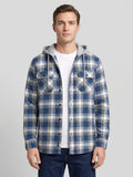 Front studio view of a model wearing a Blue plaid Flannel Jacket with a hood and button-flap chest pockets.