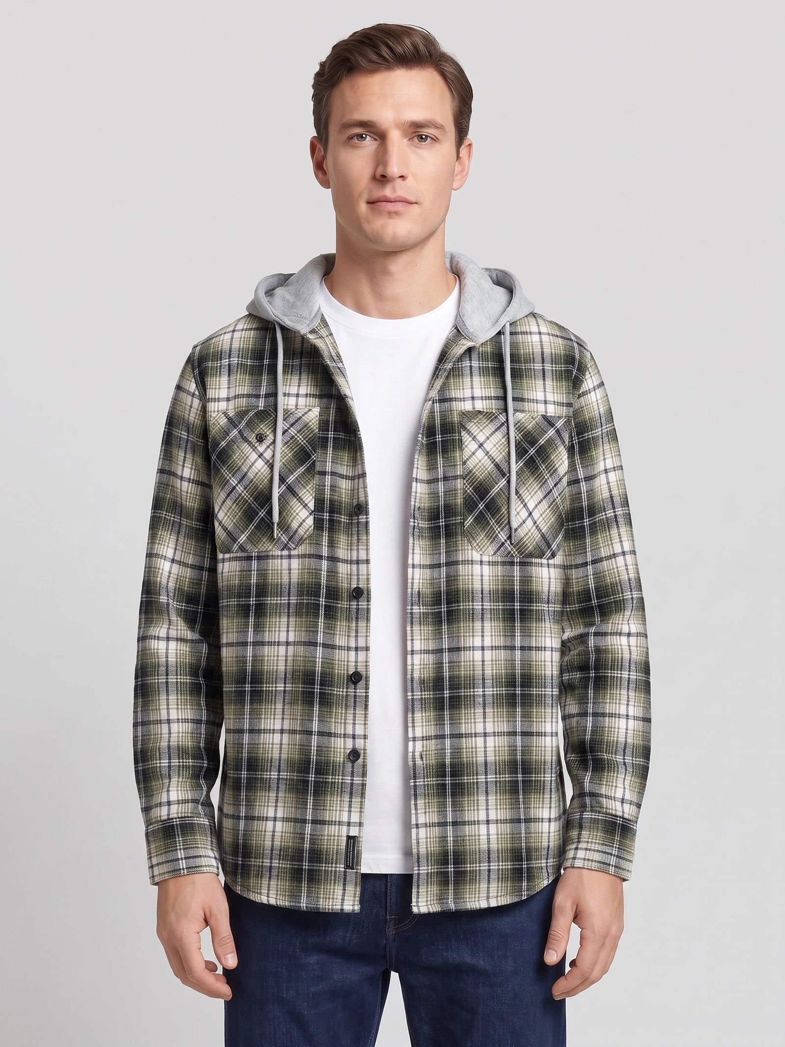 Front studio view of a model wearing a Green plaid Flannel Jacket with a hood, button front, and chest pockets.