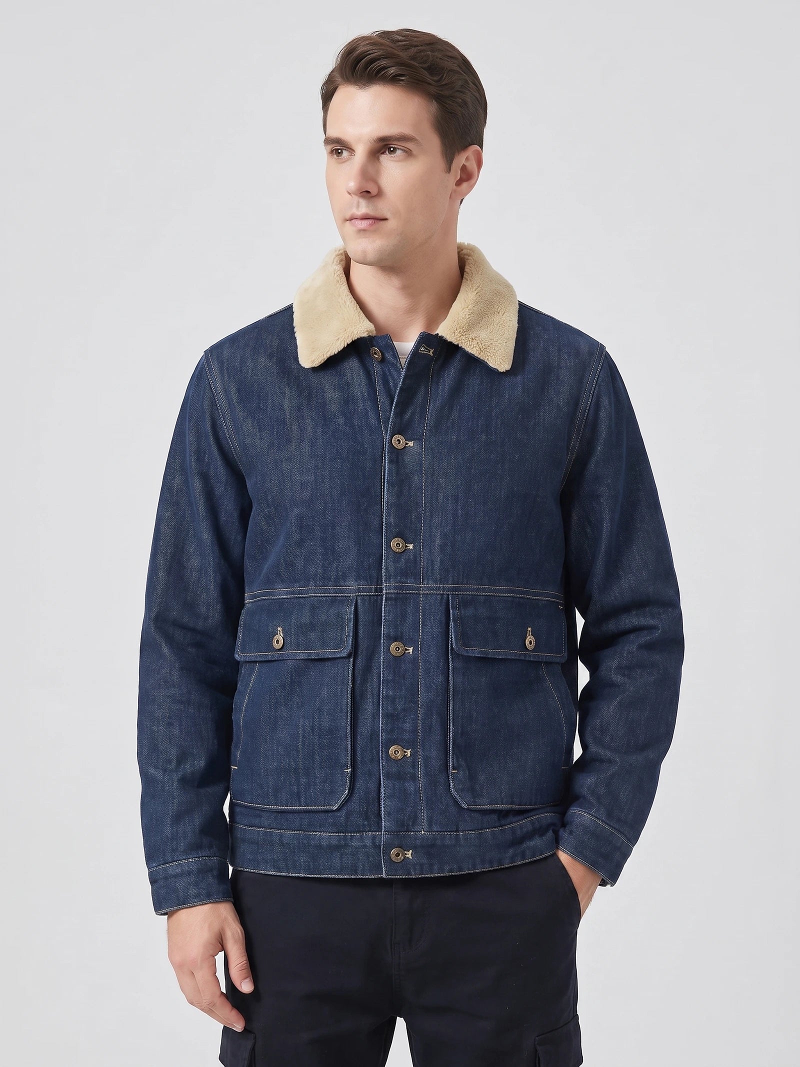 Model wearing a Blue Fleece Jacket with a soft collar, button front, and four flap pockets in a front studio view.