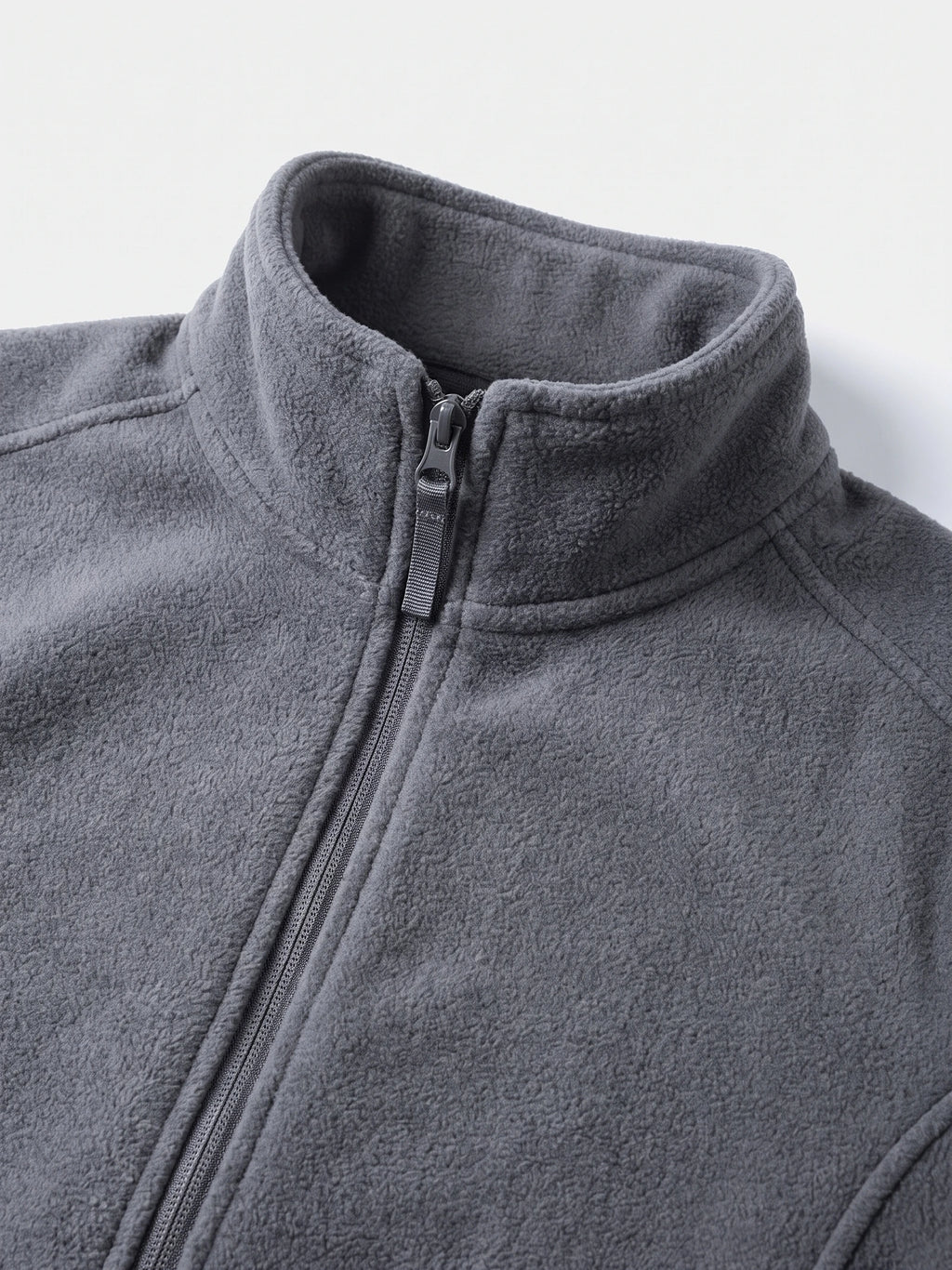 Close-up of the Gray men's Fleece Jacket showing its soft textured fabric, stand collar, and full front zipper.