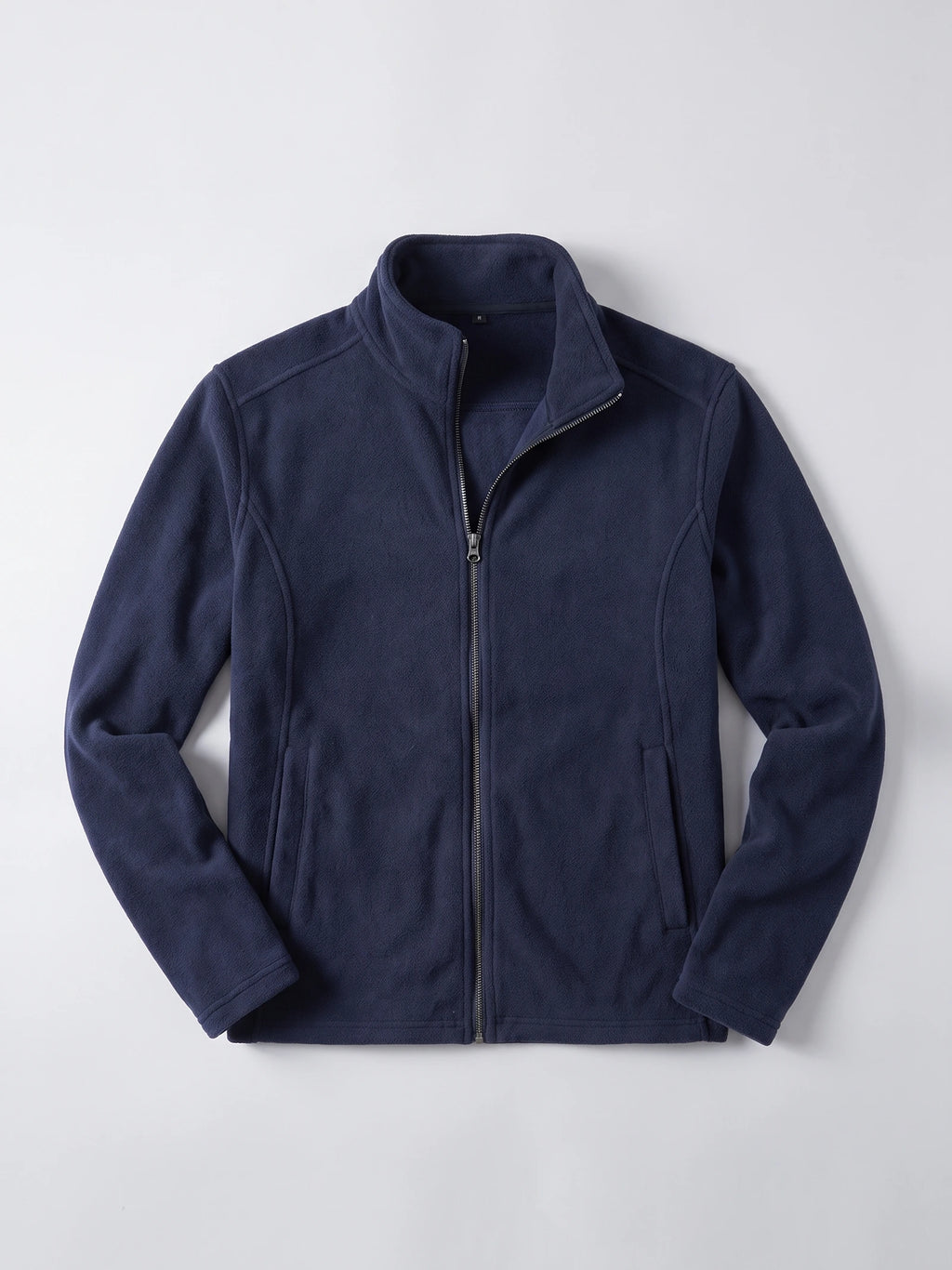 Navy men’s fleece jacket laid flat, featuring a stand collar, full front zipper, and zippered side pockets.