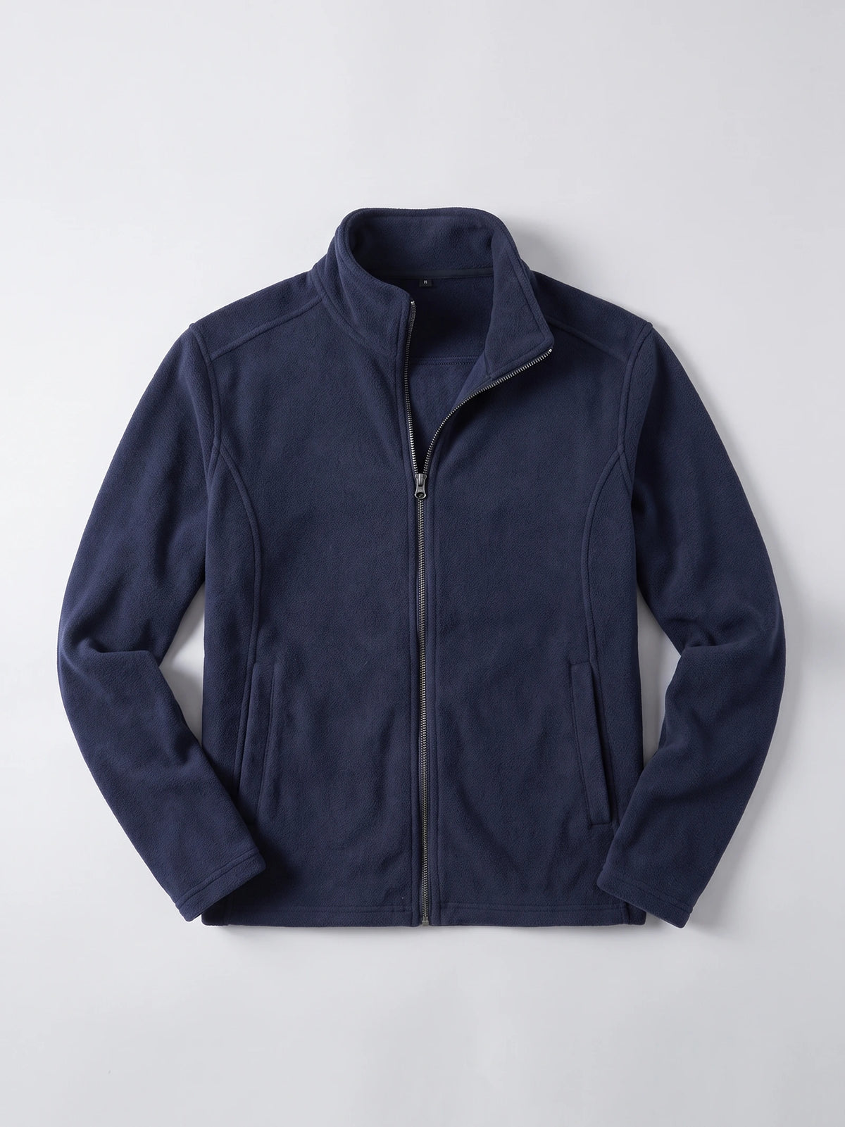 Navy men’s fleece jacket laid flat, featuring a stand collar, full front zipper, and zippered side pockets.
