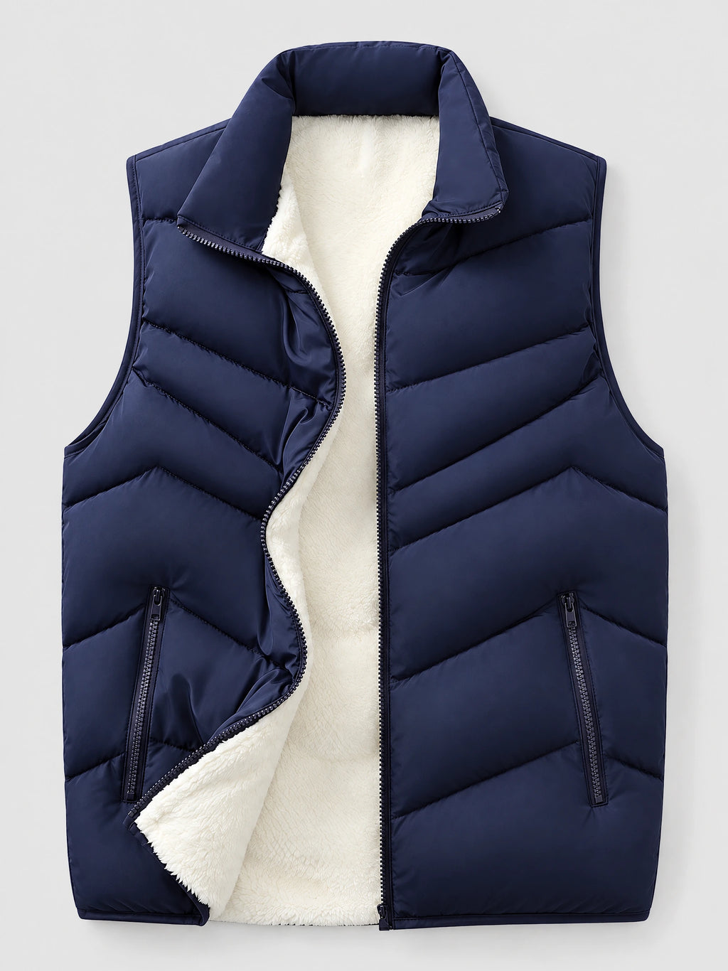 Navy fleece-lined puffer vest laid flat with a stand collar, diagonal quilting, zip front, and zippered pockets.