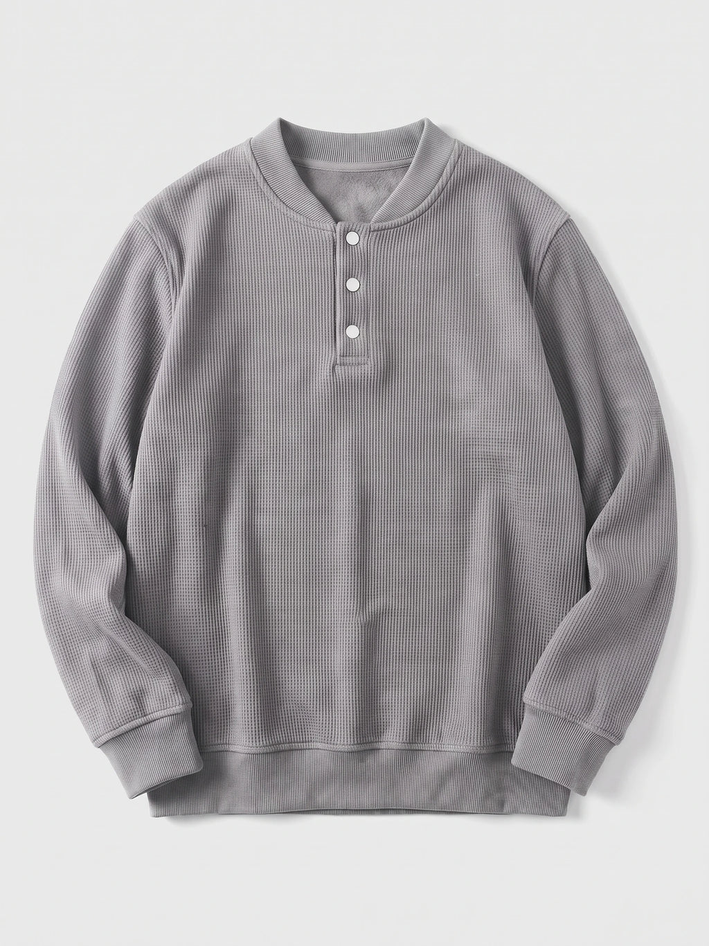 Gray fleece lined sweater laid flat, featuring a ribbed crew neckline, three-button Henley placket, and long sleeves.