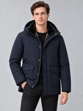 Front studio view of a model wearing a Navy heavy winter jacket with a fleece-lined stand collar, zip front, and flap pockets.