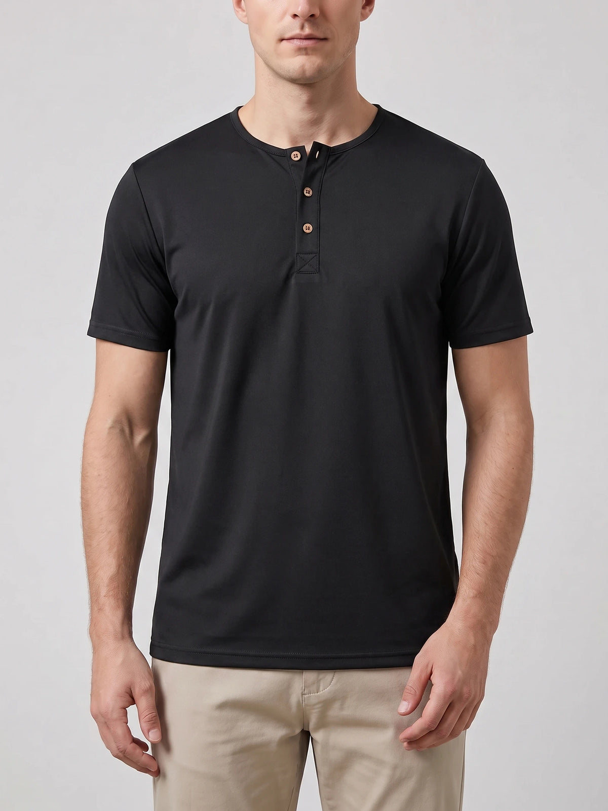 Front studio view of a model wearing a Black short-sleeve Henley T-shirt with a three-button collar.