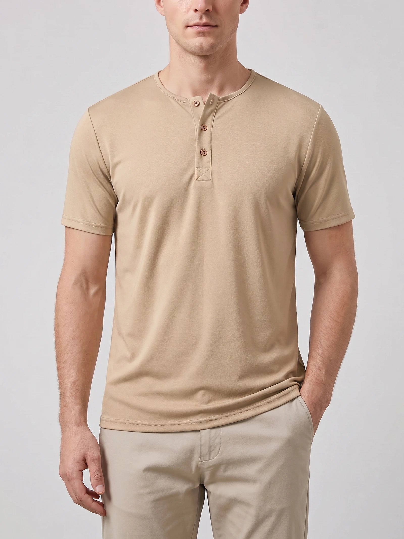 Front studio view of a model wearing a Khaki Henley T-shirt with short sleeves and a three-button collar.
