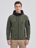 Front studio view of a model wearing a Green fleece jacket with a full zip, hood, zippered hand pockets, and sleeve pocket.