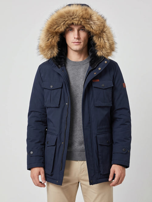 Front studio view of a model wearing a Navy men's parka with a fur-trimmed hood and flap pockets.