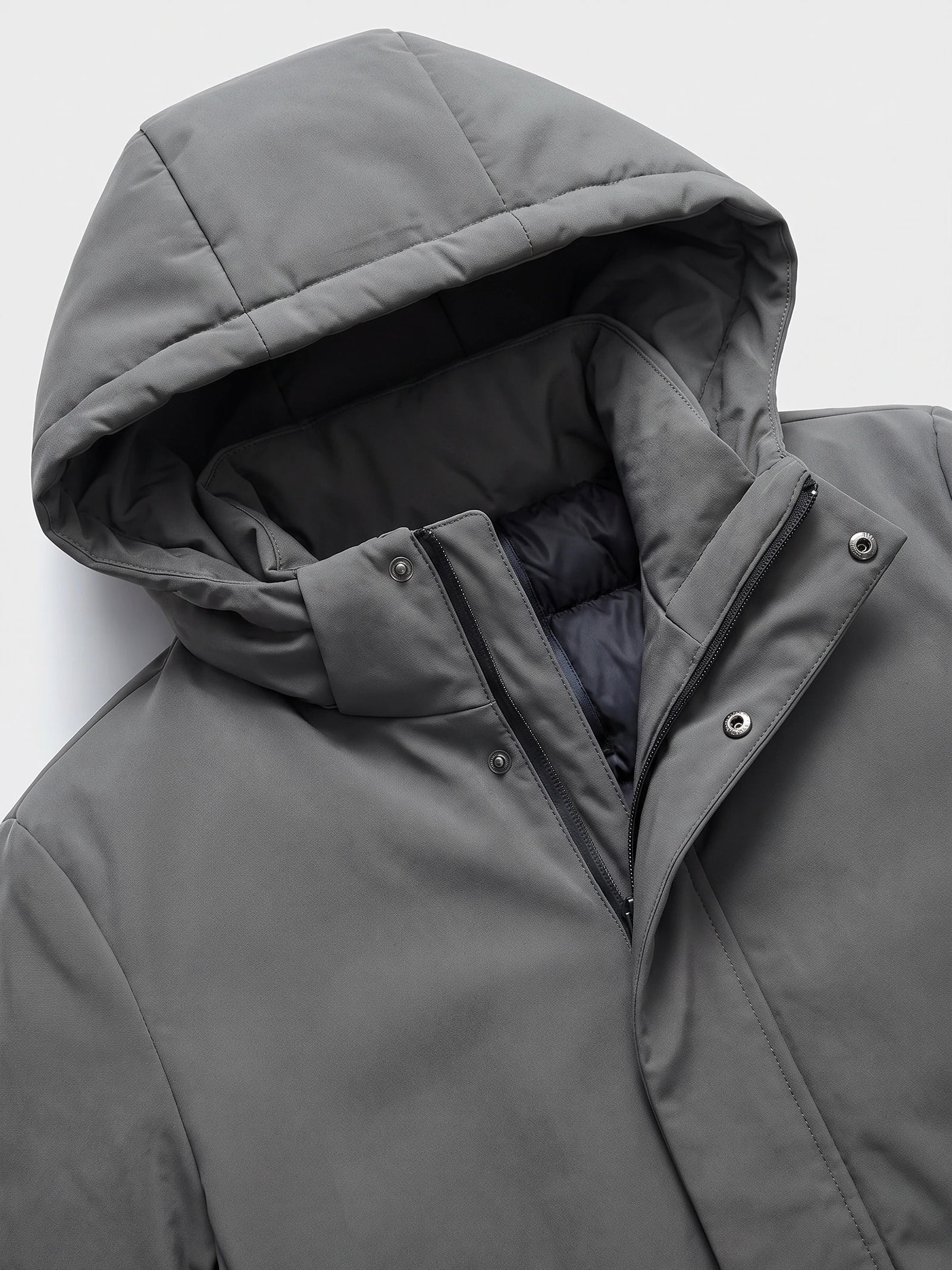 Gray Hooded Trench Coat detail showing the padded hood, zip front, snap-button storm flap, and quilted inner lining.