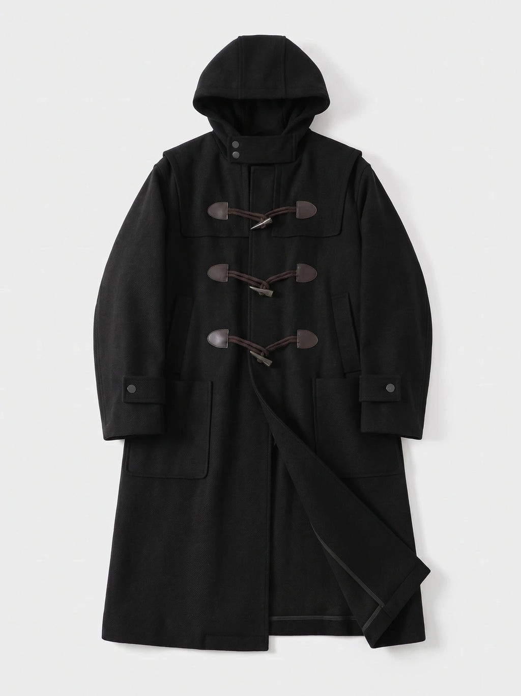 Black wool hooded trench coat laid flat, featuring toggle closures, flap pockets, cuff tabs, and a belted waist.