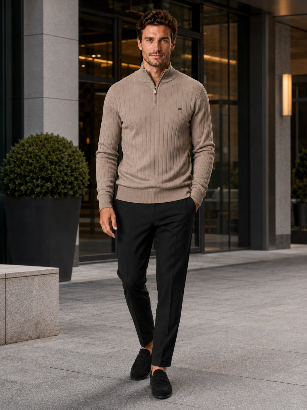 Man wearing a khaki quarter zip cotton knit sweater in a business casual fall winter outfit for everyday wear