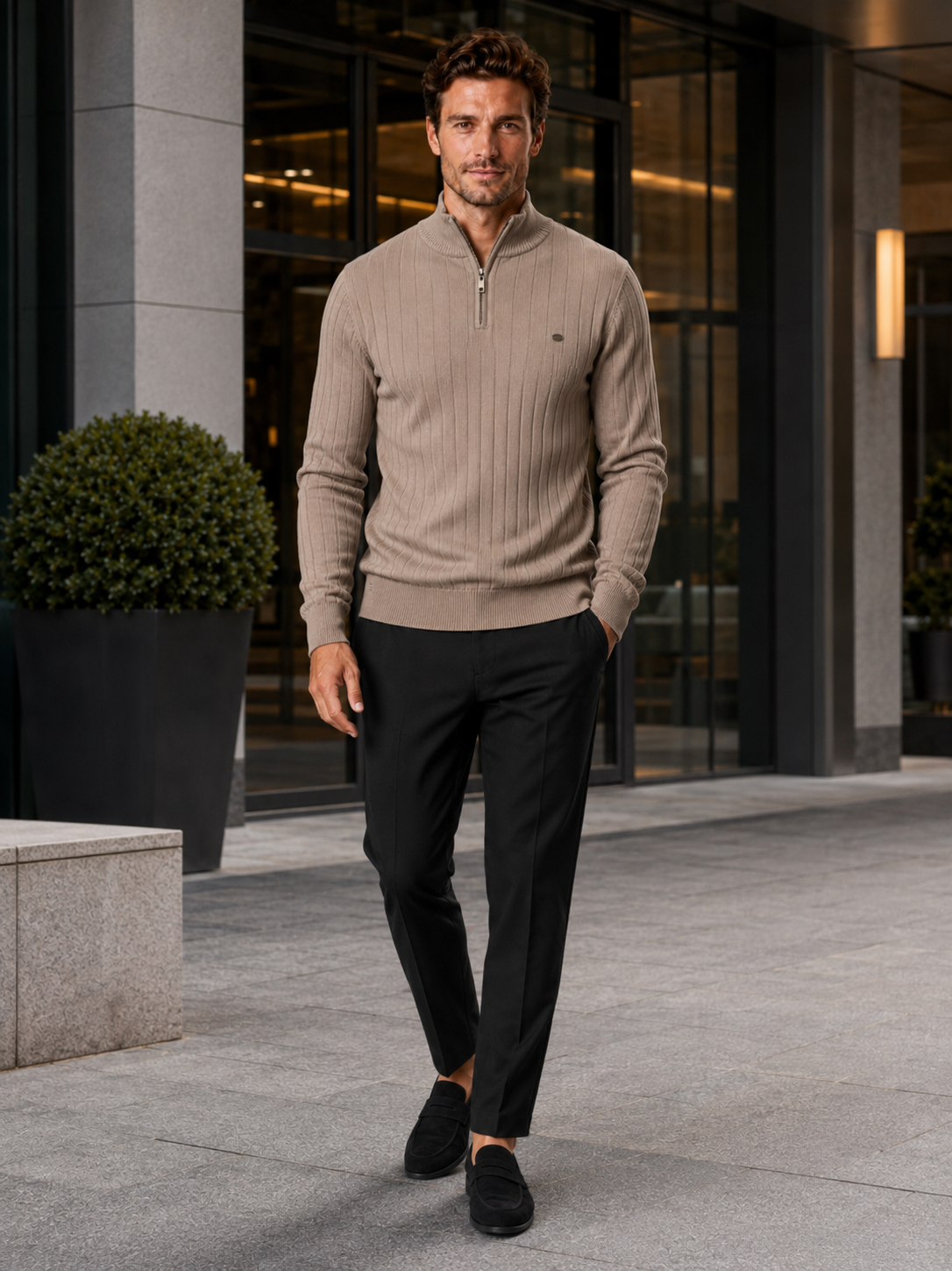 Man wearing a khaki quarter zip cotton knit sweater in a business casual fall winter outfit for everyday wear