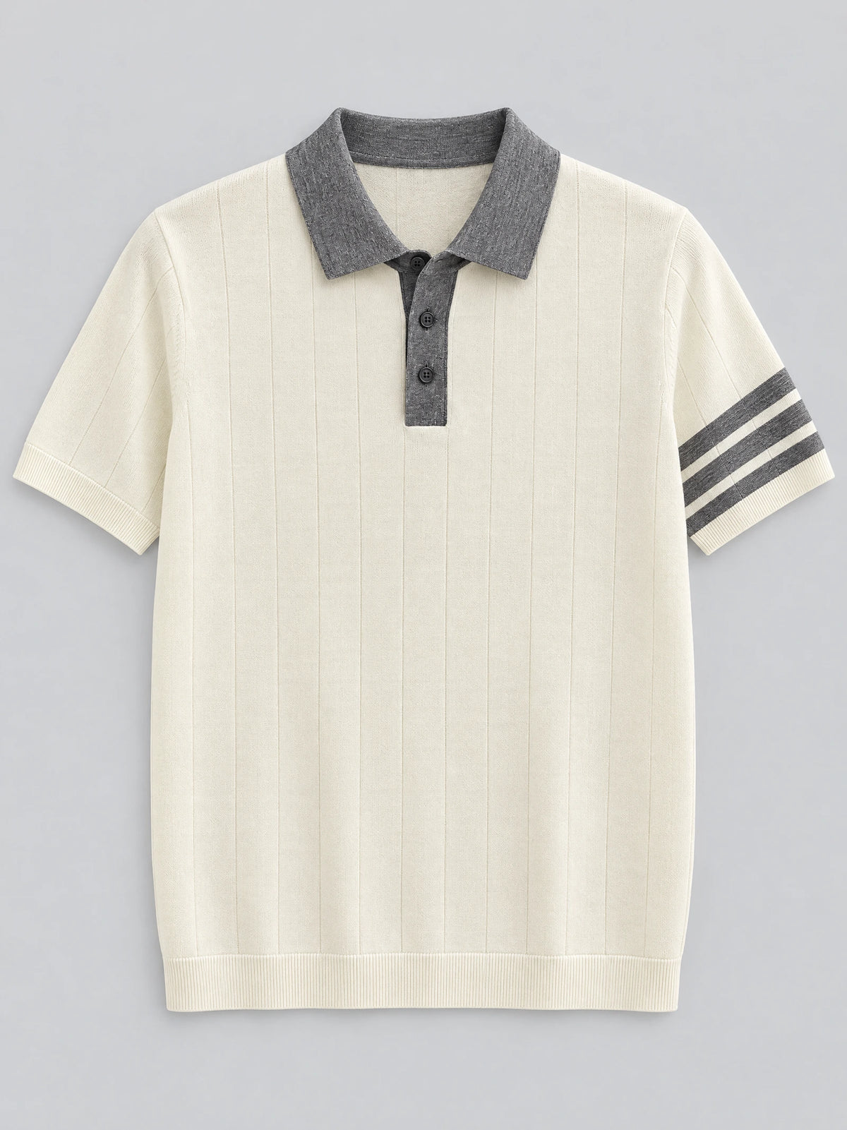 Beige knit polo shirt laid flat, featuring a contrast collar, three-button placket, vertical knit texture, and striped short-sleeve cuffs.