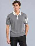 Front studio view of a model wearing a Gray Knit Polo with a textured knit body, contrast collar, and striped short sleeves.