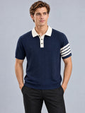Front studio view of a model wearing a Navy Knit Polo with a contrasting collar, button placket, and striped short sleeve.