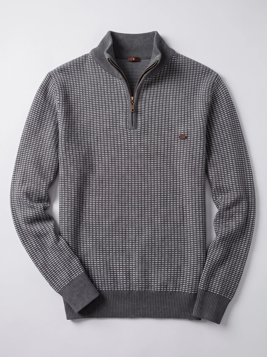 Gray Knit Quarter Zip Sweater laid flat, featuring a textured knit pattern, ribbed mock neck, cuffs, and hem.