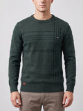 Front studio view of a model wearing a Green knitted cotton crewneck sweater with textured ribbed paneling.