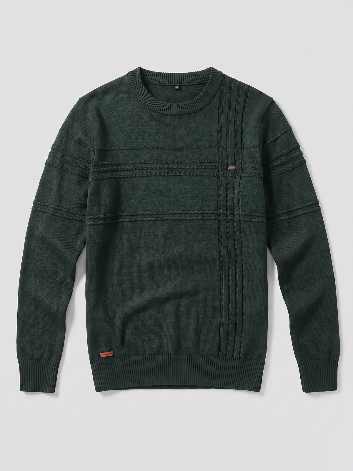 Green knitted cotton crewneck sweater laid flat, featuring textured horizontal and vertical knit detailing with ribbed cuffs and hem.