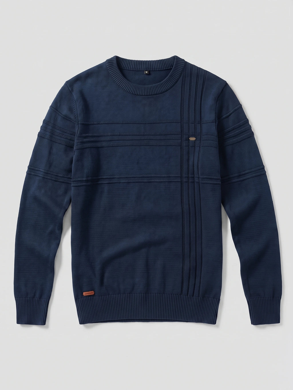 Navy knitted cotton crewneck sweater laid flat, featuring ribbed trims and raised stripe detailing across the chest and sleeves.