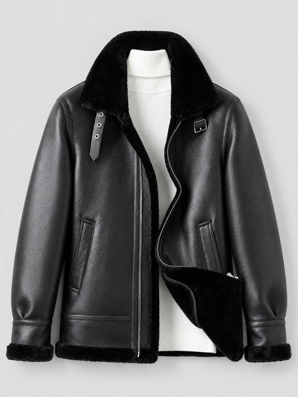 Black Leather Aviator Jacket laid flat, shown open with a plush collar and lining, zip front, buckle strap, and angled pockets.