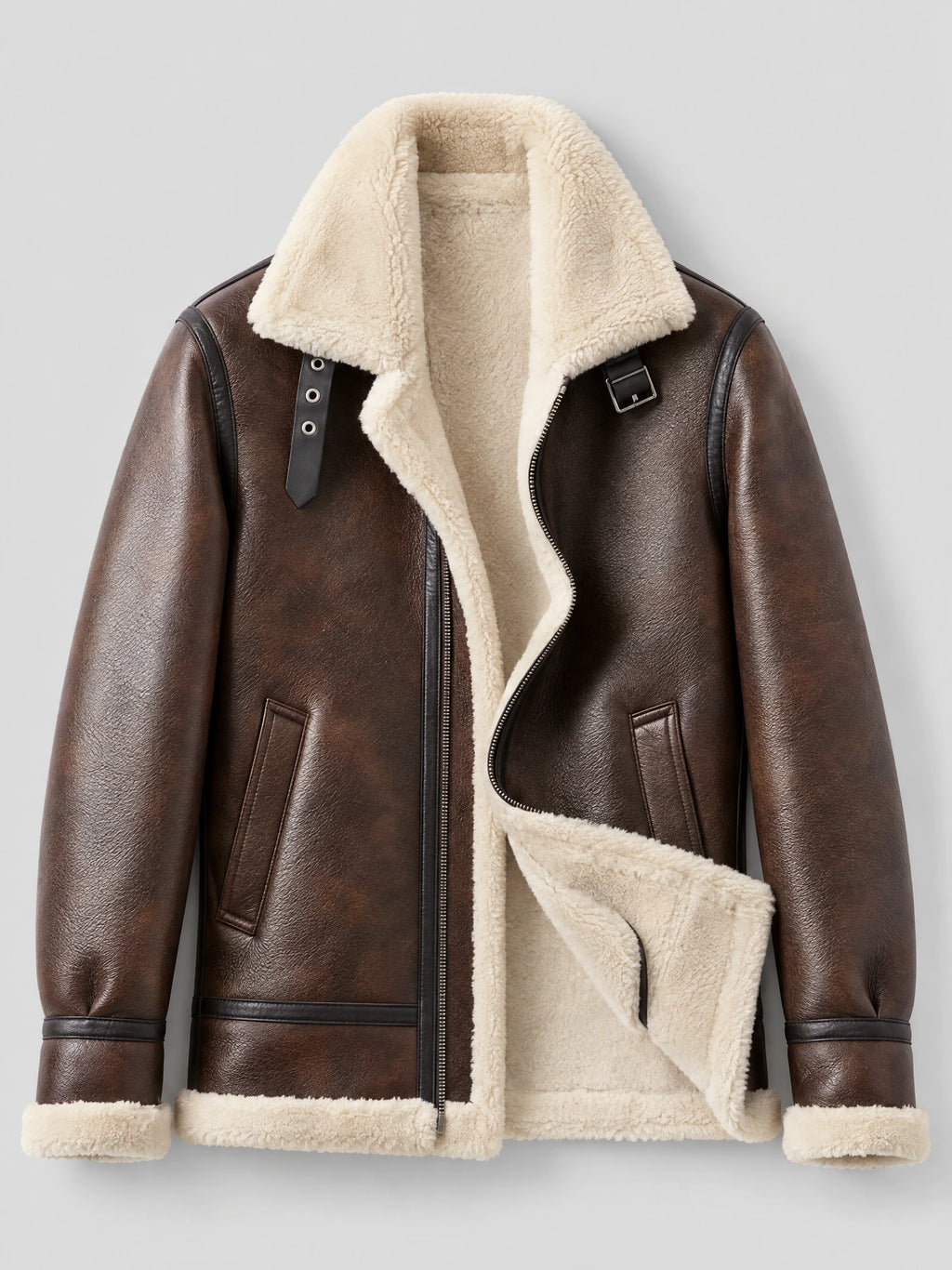 Brown Leather Aviator Jacket laid flat, showing the shearling-lined collar, asymmetric zip front, buckle strap, and front pockets.