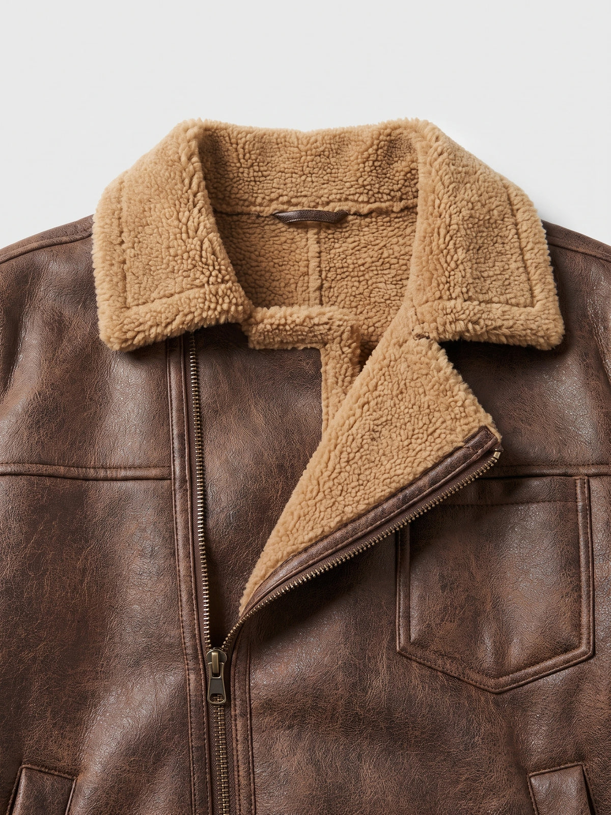 Close-up of a Brown aviator-style men's PU leather jacket with a shearling collar, front zipper, and chest pocket.