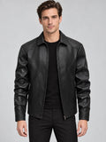 Front studio view of a model wearing a Black leather bomber jacket with a zip front, pointed collar, and zippered pockets.