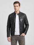 Front studio view of a model wearing a Black men's leather jacket with a stand collar, front zipper, and zippered chest pockets.