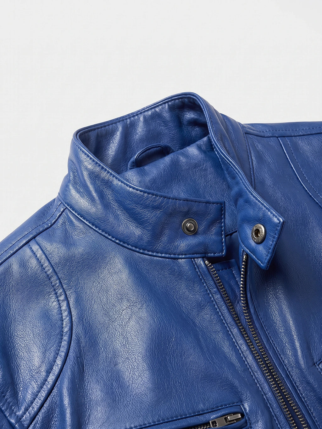 Close-up of the Blue Men's Leather Jacket showing the stand collar, snap tab, textured PU leather, and front zipper.