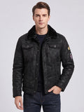 Front studio view of a model wearing a Black leather jacket with a plush collar, snap-button chest pockets, and sleeve patches.