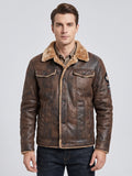 Front studio view of a model wearing a Brown leather jacket with a fleece collar, button closure, and chest flap pockets.