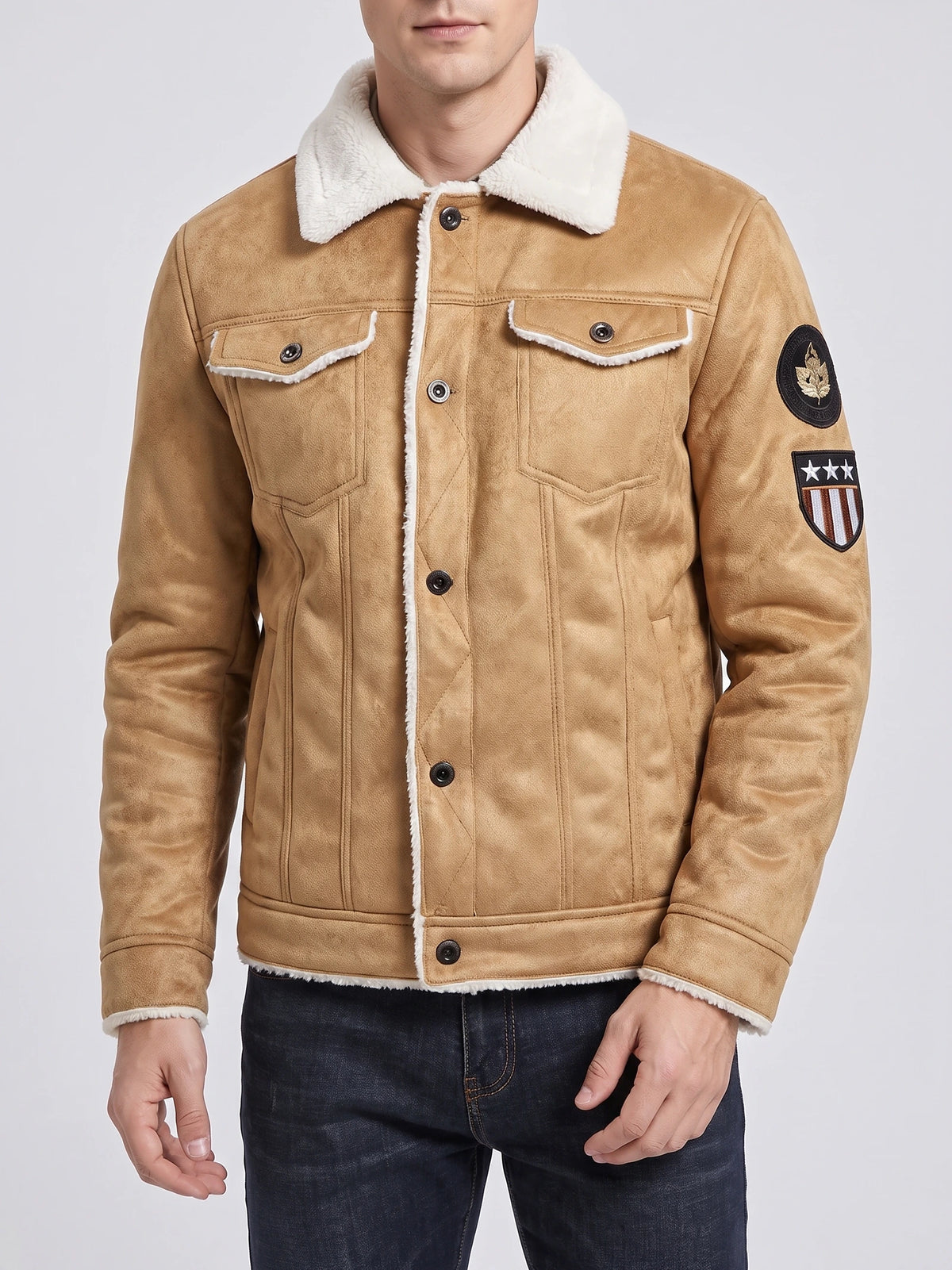 Front studio view of a model wearing a Khaki leather jacket with a fleece-lined collar, snap buttons, chest pockets, and sleeve patches.