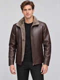 Front studio view of a model wearing a Brown Leather Moto Jacket with a plush-lined collar, zip front, and quilted shoulder panels.
