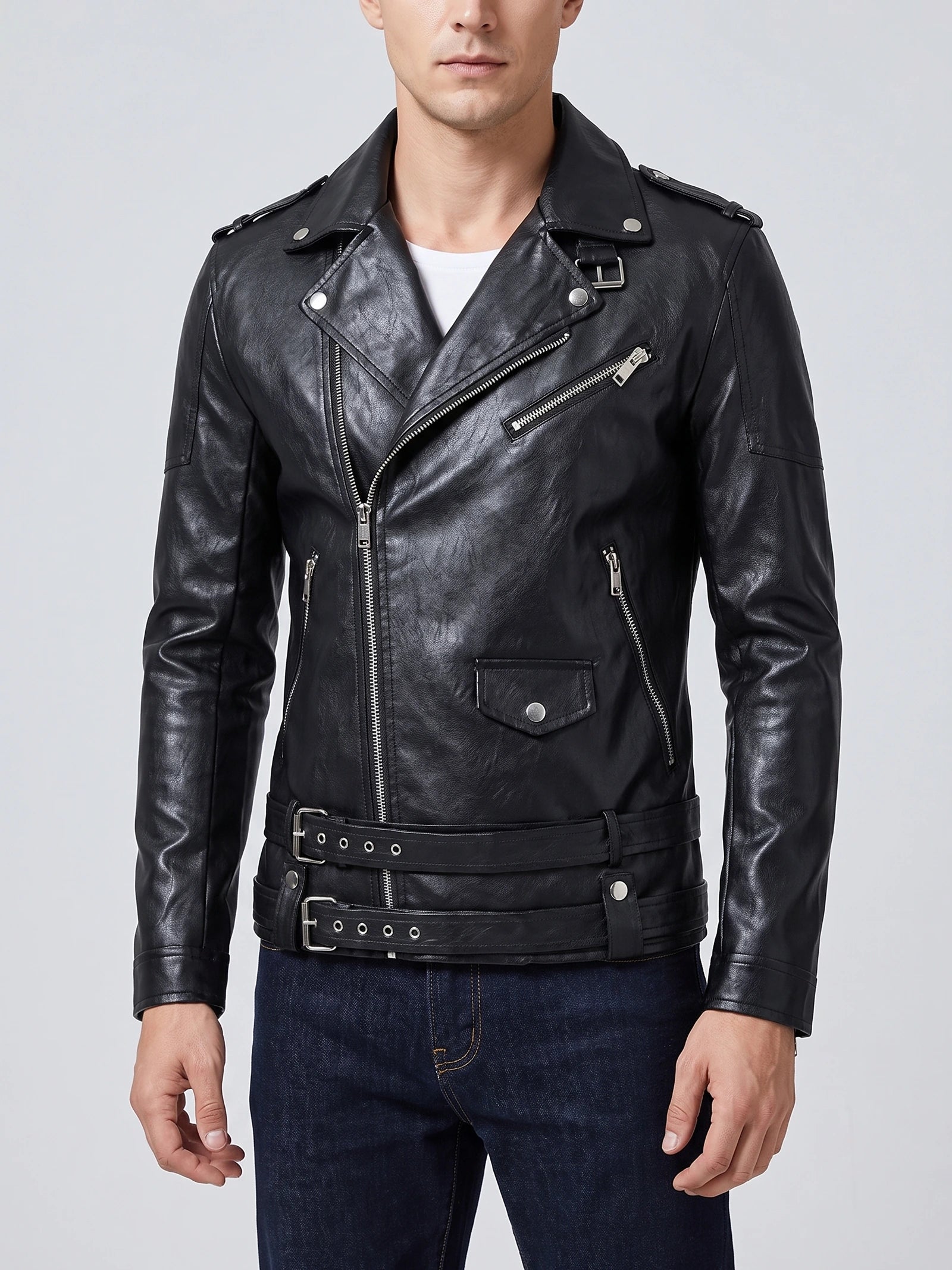 Model wearing a Black PU Leather Motorcycle Jacket in a front studio view, featuring an asymmetric zip, belted waist, and zippered pockets.