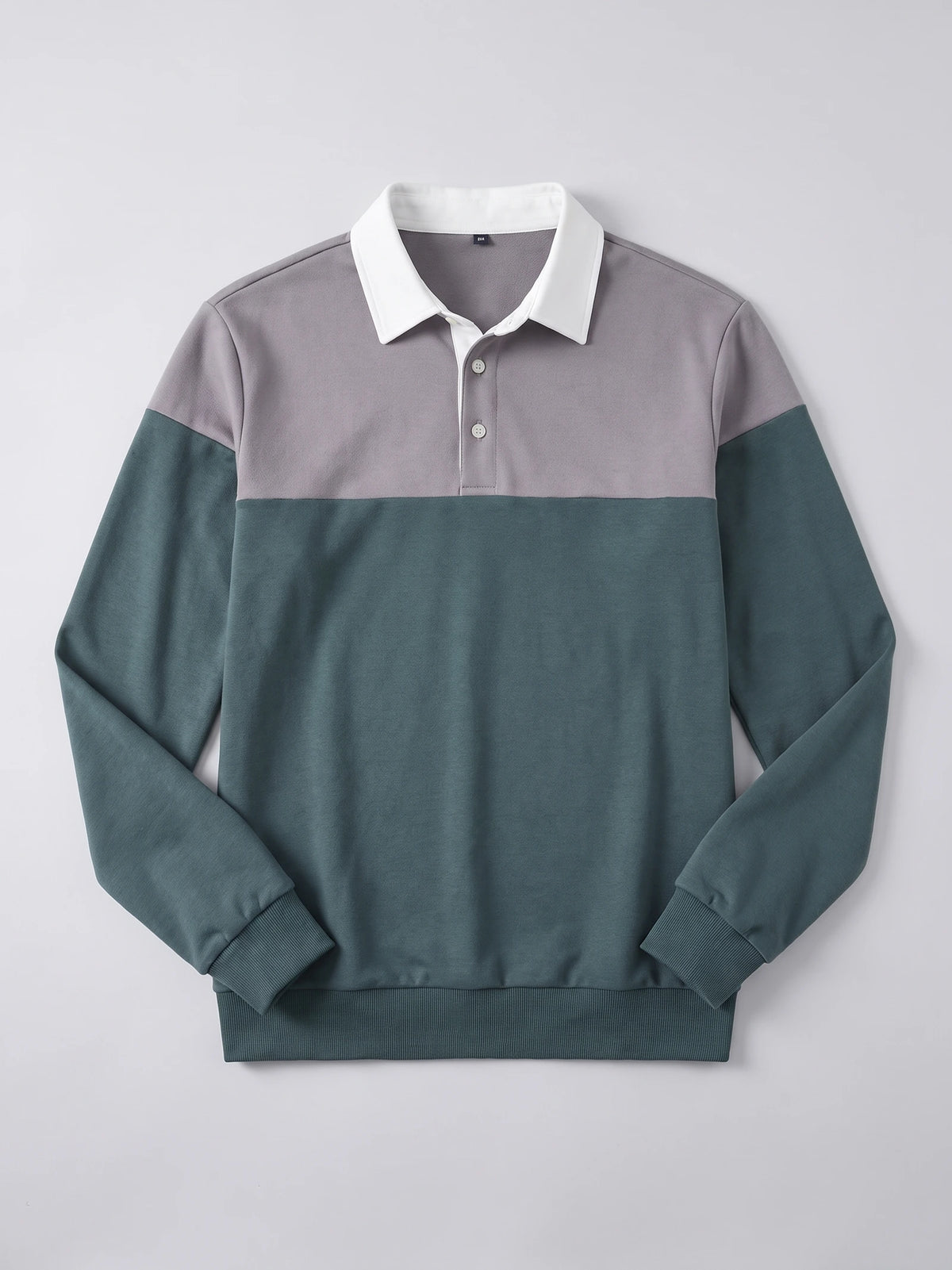 Gray Long Sleeve Polo laid flat, featuring a pointed collar, two-button placket, color-blocked front, and ribbed cuffs and hem.