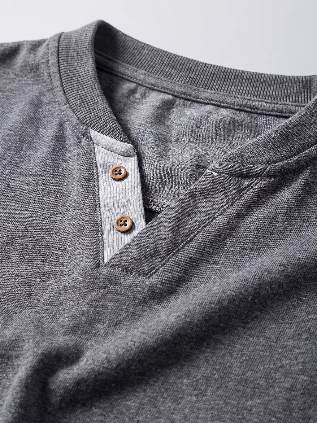 Gray cotton Long Sleeve Henley Shirt detail showing the ribbed collar and two-button placket.