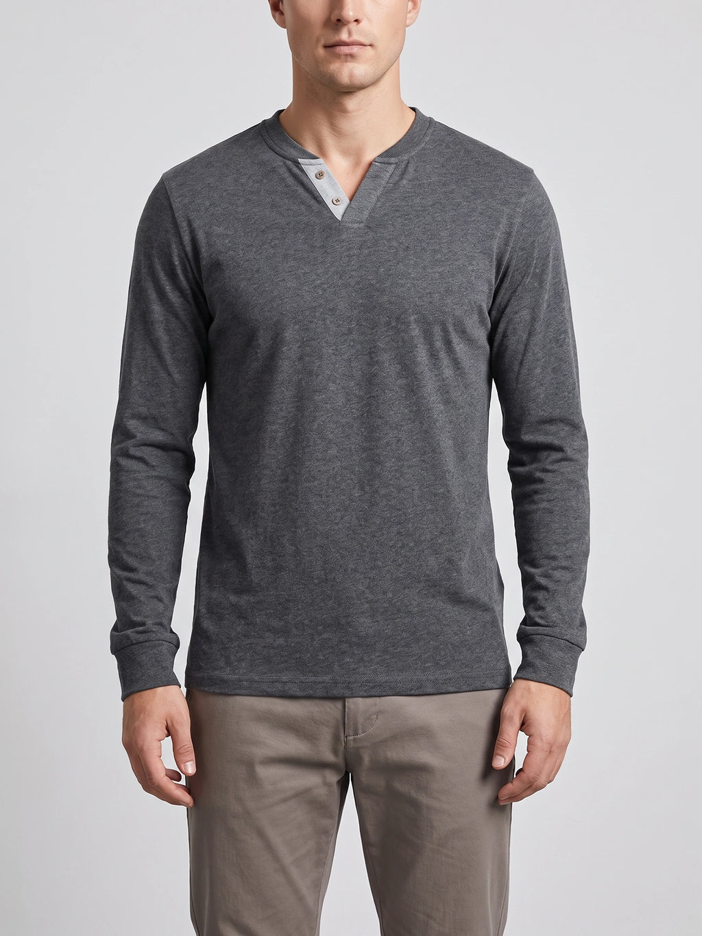 Front studio view of a model wearing a Gray long sleeve Henley shirt with a two-button placket.