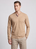 Model wearing a Khaki cotton Long Sleeve Henley Shirt with a three-button placket in a front studio view.